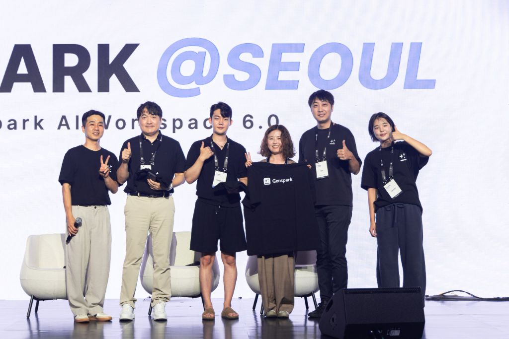Six Genspark teammates on stage at Genspark @ Seoul in front of a large @SEOUL screen
